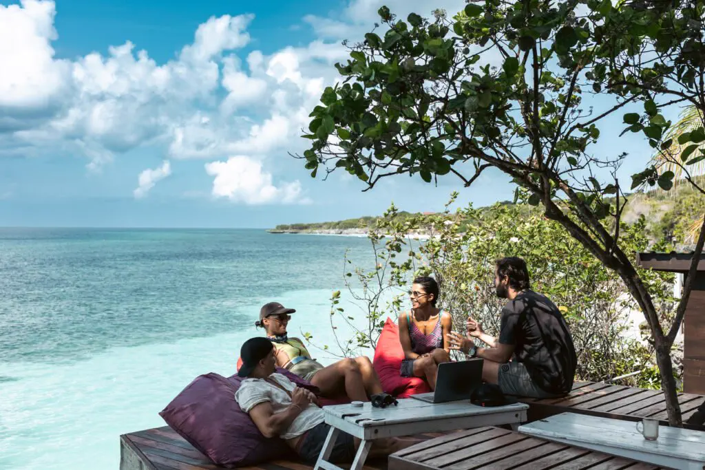 Travelers gathered at a GaiaOne eco-retreat